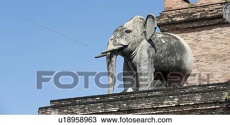 Stock Image - Elephant statue at Wat Chedi Luang, Chiang Mai, Thailand. Fotosearch