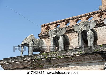 Stock Photography - Elephant statues at Wat Chedi Luang, Chiang Mai, Thailand. Fotosearch