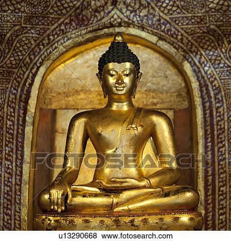 Stock Photo - Golden statue of Buddha at Wat Phra Singh, Chiang Mai, Thailand. Fotosearch