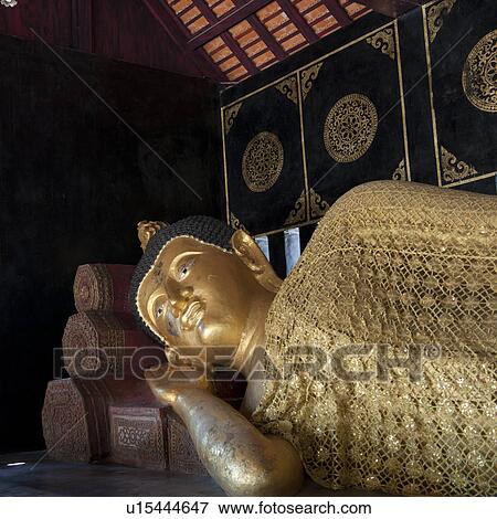 Stock Photo - Golden statue of reclining Buddha at Wat Chedi Luang, Chiang Mai, Thailand. Fotosearch