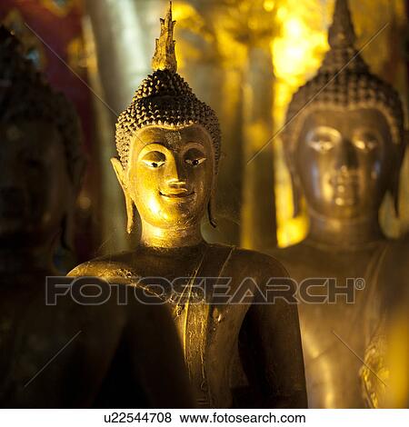 Golden statues of Buddha at Wat Phra Singh, Chiang Mai, Thailand View Large Photo Image Stock Photo - Golden statues of Buddha at Wat Phra Singh, Chiang Mai, Thailand. Fotosearch