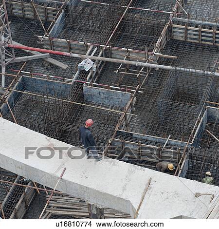 Picture - High angle view of an under construction building, Binhai, Tianjin, China. Fotosearch