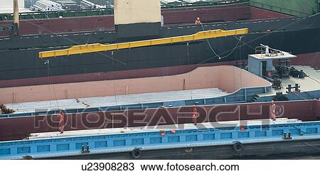 Stock Image - High angle view of container ships, Yangtze River, Shanghai, China. Fotosearch