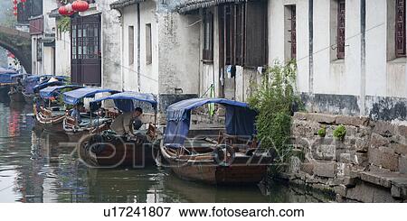 Houses along a canal, Zhouzhuang, Jiangsu Province, China View Large Photo Image Stock Photo - Houses along a canal, Zhouzhuang, Jiangsu Province, China. Fotosearch