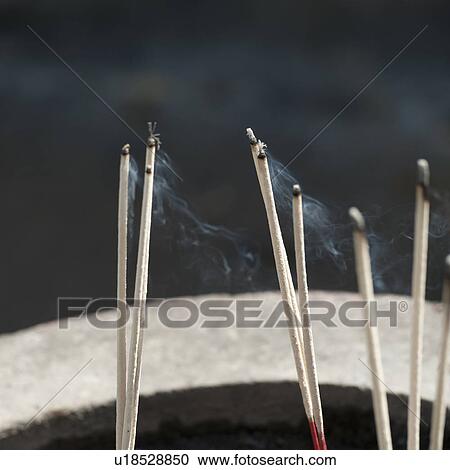 Incense stick burning at Wat Phra That Doi Kong Mu temple, Mae Hong Son, Thailand View Large Photo Image Stock Image - Incense stick burning at Wat Phra That Doi Kong Mu temple, Mae Hong Son, Thailand. Fotosearch