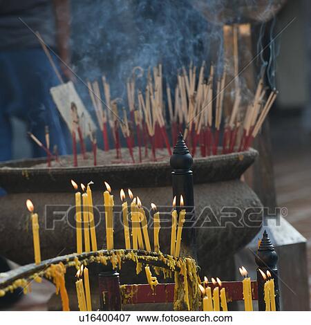 Incense sticks and candles burning at Wat Phrathat Doi Suthep, Chiang Mai, Thailand View Large Photo Image Stock Photo - Incense sticks and candles burning at Wat Phrathat Doi Suthep, Chiang Mai, Thailand. Fotosearch