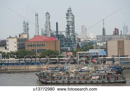 Industry in a city, Yangtze River, Shanghai, China View Large Photo Image Stock Image - Industry in a city, Yangtze River, Shanghai, China. Fotosearch