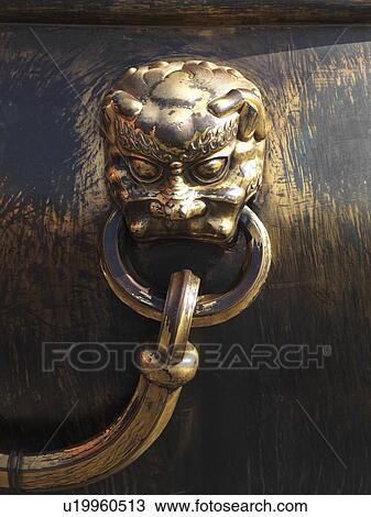 Lion handle on a bronze urn at the Forbidden City, Beijing, China View Large Photo Image Stock Image - Lion handle on a bronze urn at the Forbidden City, Beijing, China. Fotosearch