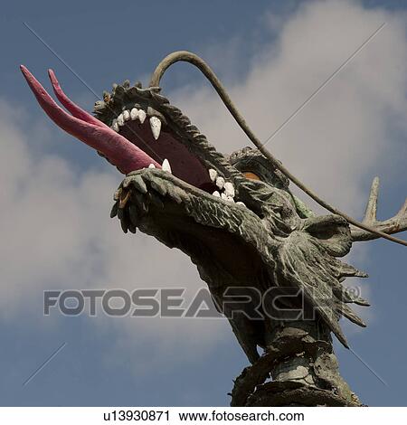 Stock Image - Low angle view of a dragon's statue in Yongdusan Park, Jung-gu, Busan, Yeongnam, South Korea. Fotosearch