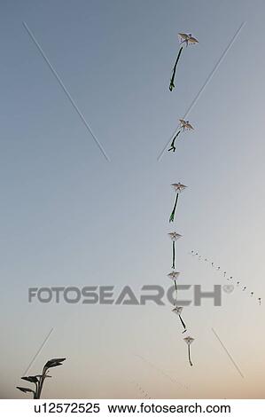 Low angle view of kites in the sky, Olympic Green, Beijing, China View Large Photo Image Stock Photography - Low angle view of kites in the sky, Olympic Green, Beijing, China. Fotosearch