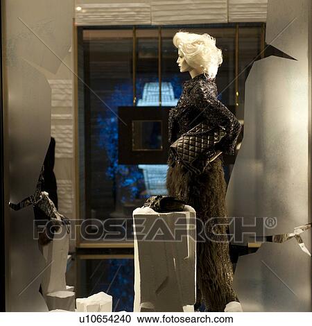 Stock Image - Mannequin at a window display, Shanghai, China. Fotosearch