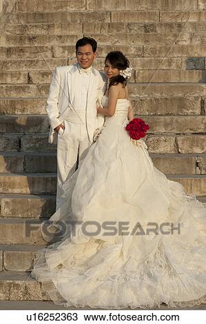 Newlywed couple at the Temple Of Heaven, Beijing, China View Large Photo Image Stock Image - Newlywed couple at the Temple Of Heaven, Beijing, China. Fotosearch