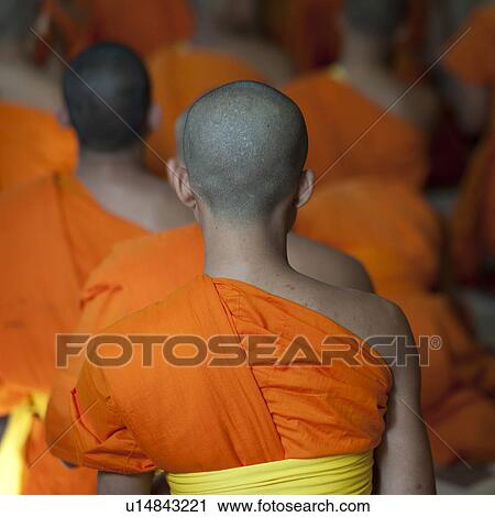 Novice monks praying at Wat Sri Soda, Chiang Mai, Thailand View Large Photo Image Stock Image - Novice monks praying at Wat Sri Soda, Chiang Mai, Thailand. Fotosearch