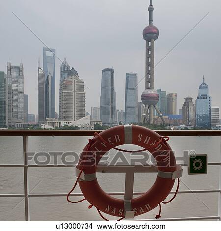 Oriental Pearl Tower and city skyline, Huangpu River, Pudong, Shanghai, China View Large Photo Image Picture - Oriental Pearl Tower and city skyline, Huangpu River, Pudong, Shanghai, China. Fotosearch