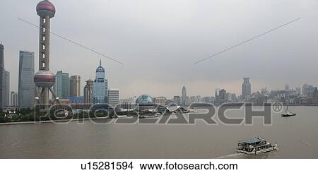 Oriental Pearl Tower and city skyline, Huangpu River, Pudong, Shanghai, China View Large Photo Image Picture - Oriental Pearl Tower and city skyline, Huangpu River, Pudong, Shanghai, China. Fotosearch