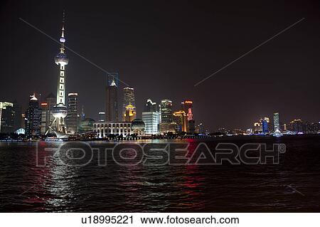 Oriental Pearl Tower and city skyline, Huangpu River, Pudong, Shanghai, China View Large Photo Image Stock Image - Oriental Pearl Tower and city skyline, Huangpu River, Pudong, Shanghai, China. Fotosearch
