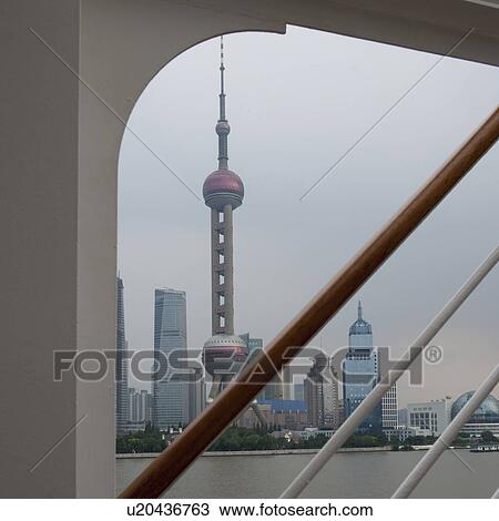 Oriental Pearl Tower and city skyline, Huangpu River, Pudong, Shanghai, China View Large Photo Image Stock Image - Oriental Pearl Tower and city skyline, Huangpu River, Pudong, Shanghai, China. Fotosearch