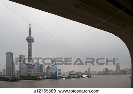 Oriental Pearl Tower and city skyline, Huangpu River, Pudong, Shanghai, China View Large Photo Image Stock Photo - Oriental Pearl Tower and city skyline, Huangpu River, Pudong, Shanghai, China. Fotosearch