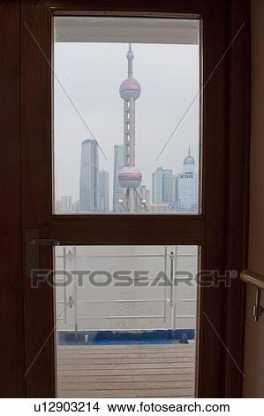 Picture - Oriental Pearl Tower viewed from a cruise ship, Huangpu River, Pudong, Shanghai, China. Fotosearch