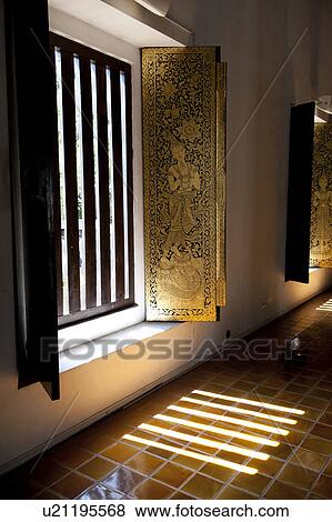 Stock Photo - Painting on the window in Wat Phra Singh, Chiang Mai, Thailand. Fotosearch