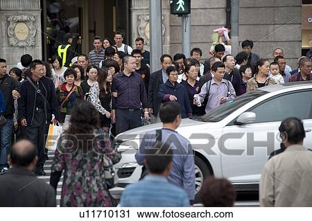 People crossing the road, Shanghai, China View Large Photo Image Stock Image - People crossing the road, Shanghai, China. Fotosearch