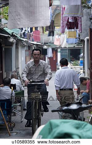 People in a street, Shanghai, China View Large Photo Image Stock Photography - People in a street, Shanghai, China. Fotosearch