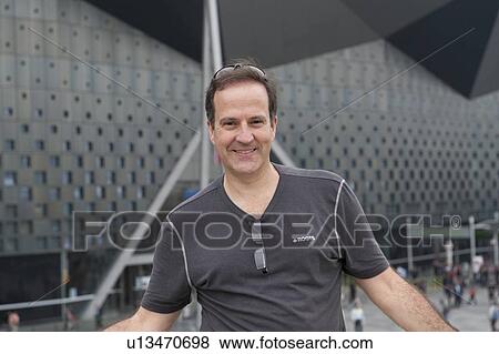 Stock Photo - Portrait of a man in Theme pavilion at Shanghai World Expo, Shanghai, China. Fotosearch