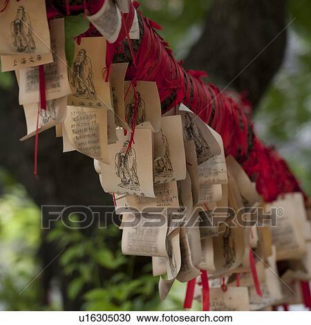 Prayer ribbons tied to a tree, Shanghai, China View Large Photo Image Stock Image - Prayer ribbons tied to a tree, Shanghai, China. Fotosearch