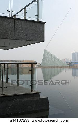 Reflection of a pyramid in water, TEDA Promenade, Binhai, Tianjin, China View Large Photo Image Stock Image - Reflection of a pyramid in water, TEDA Promenade, Binhai, Tianjin, China. Fotosearch