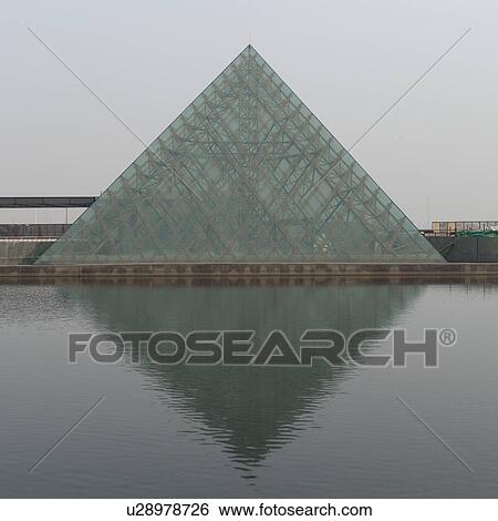 Reflection of a pyramid in water, TEDA Promenade, Binhai, Tianjin, China View Large Photo Image Stock Photograph - Reflection of a pyramid in water, TEDA Promenade, Binhai, Tianjin, China. Fotosearch