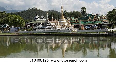 Stock Photography - Reflection of Wat Chong Kham temple in water, Mae Hong Son, Thailand. Fotosearch