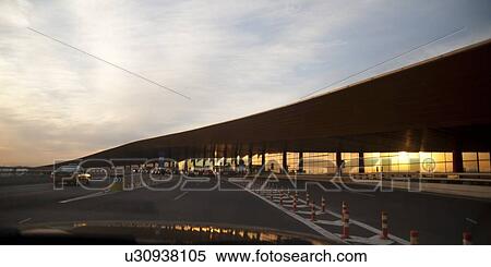 Road leading towards the Beijing Capital International Airport, Beijing, China View Large Photo Image Stock Photography - Road leading towards the Beijing Capital International Airport, Beijing, China. Fotosearch