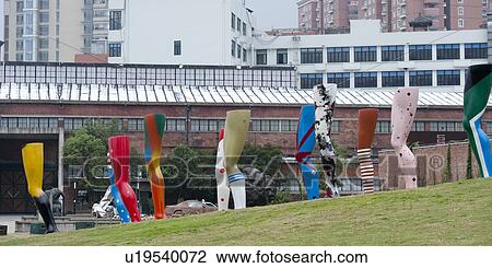 Stock Image - Sculptures of human legs at the Ke Center for the Contemporary Arts, Shanghai, China. Fotosearch