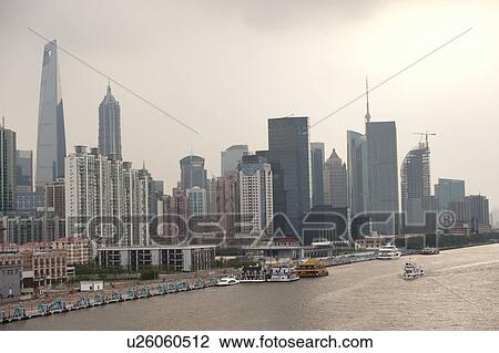 Skyscrapers at the waterfront, Huangpu River, Pudong, Shanghai, China View Large Photo Image Stock Image - Skyscrapers at the waterfront, Huangpu River, Pudong, Shanghai, China. Fotosearch