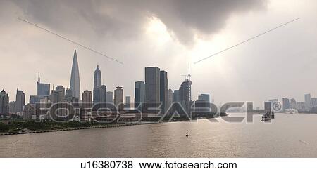 Skyscrapers at the waterfront, Huangpu River, Pudong, Shanghai, China View Large Photo Image Stock Photo - Skyscrapers at the waterfront, Huangpu River, Pudong, Shanghai, China. Fotosearch
