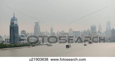 Stock Photo - Skyscrapers at the waterfront, Huangpu River, Pudong, Shanghai, China. Fotosearch