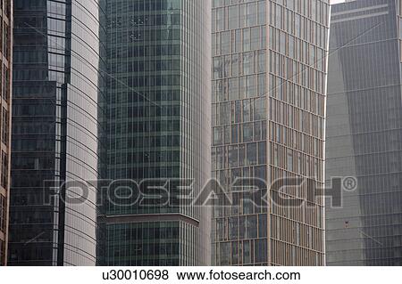 Skyscrapers in a city, Lujiazui, Pudong, Shanghai, China View Large Photo Image Stock Photo - Skyscrapers in a city, Lujiazui, Pudong, Shanghai, China. Fotosearch