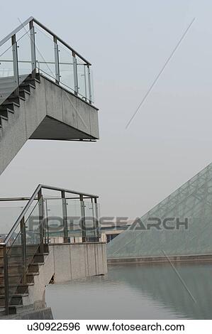 Staircases of a building, TEDA Promenade, Binhai, Tianjin, China View Large Photo Image Stock Photograph - Staircases of a building, TEDA Promenade, Binhai, Tianjin, China. Fotosearch
