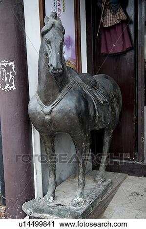 Statue in front of a building, Zhouzhuang, Jiangsu Province, China View Large Photo Image Stock Image - Statue in front of a building, Zhouzhuang, Jiangsu Province, China. Fotosearch
