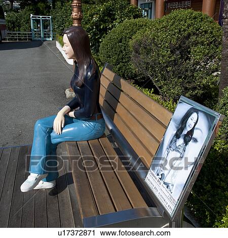Statue of a woman and a photo frame on a bench in Yongdusan Park, Jung-gu, Busan, Yeongnam, South Korea View Large Photo Image Stock Image - Statue of a woman and a photo frame on a bench in Yongdusan Park, Jung-gu, Busan, Yeongnam, South Korea. Fotosearch