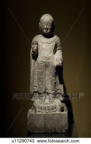 Stock Image - Statue of Buddha in the Shanghai Museum, Shanghai, China. Fotosearch