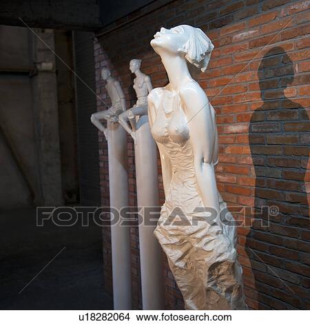 Picture - Statues in the Ke Center for the Contemporary Arts, Shanghai, China. Fotosearch