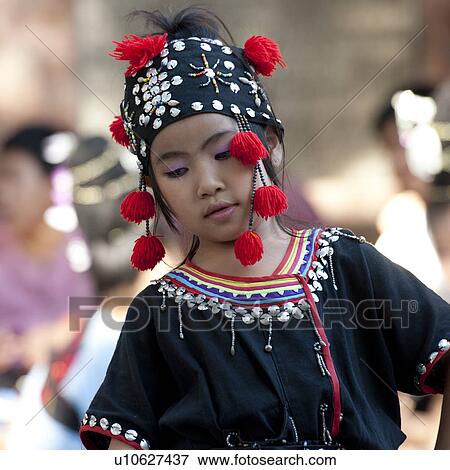 Stock Photo - Thai girl dancing at Wat Phrathat Doi Suthep, Chiang Dao, Chiang Mai Province, Thailand. Fotosearch