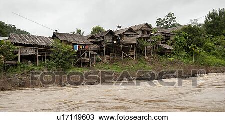 Thatched roofed house at Huay Pu Keng, Mae Hong Son Province, Thailand View Large Photo Image Stock Image - Thatched roofed house at Huay Pu Keng, Mae Hong Son Province, Thailand. Fotosearch