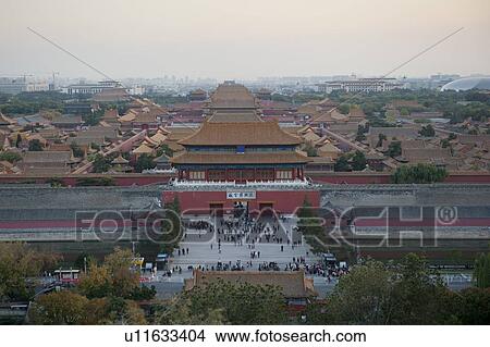Tourist at the Gate of Divine Might, Forbidden City, Beijing, China View Large Photo Image Picture - Tourist at the Gate of Divine Might, Forbidden City, Beijing, China. Fotosearch
