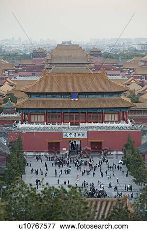 Tourist at the Gate of Divine Might, Forbidden City, Beijing, China View Large Photo Image Stock Photo - Tourist at the Gate of Divine Might, Forbidden City, Beijing, China. Fotosearch
