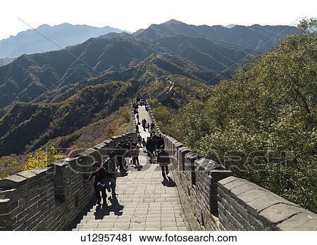 Stock Image - Tourists at the Mutianyu section of the Great Wall of China, Beijing, China. Fotosearch