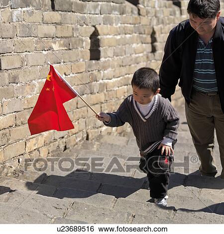 Stock Photograph - Tourists at the Mutianyu section of the Great Wall of China, Beijing, China. Fotosearch