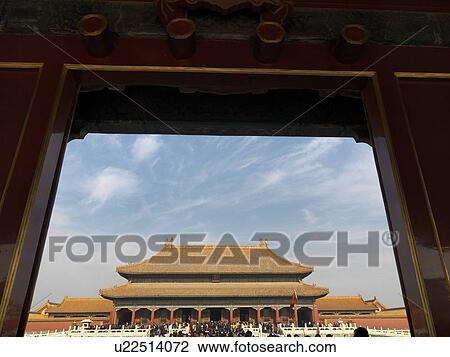 Stock Image - Tourists in the courtyard of a palace, Forbidden City, Beijing, China. Fotosearch
