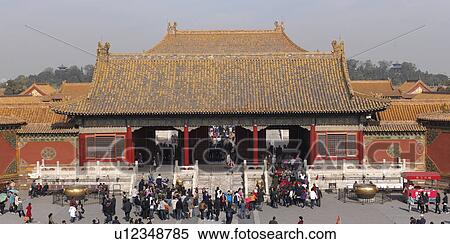 Stock Photography - Tourists in the courtyard of a palace, Forbidden City, Beijing, China. Fotosearch
